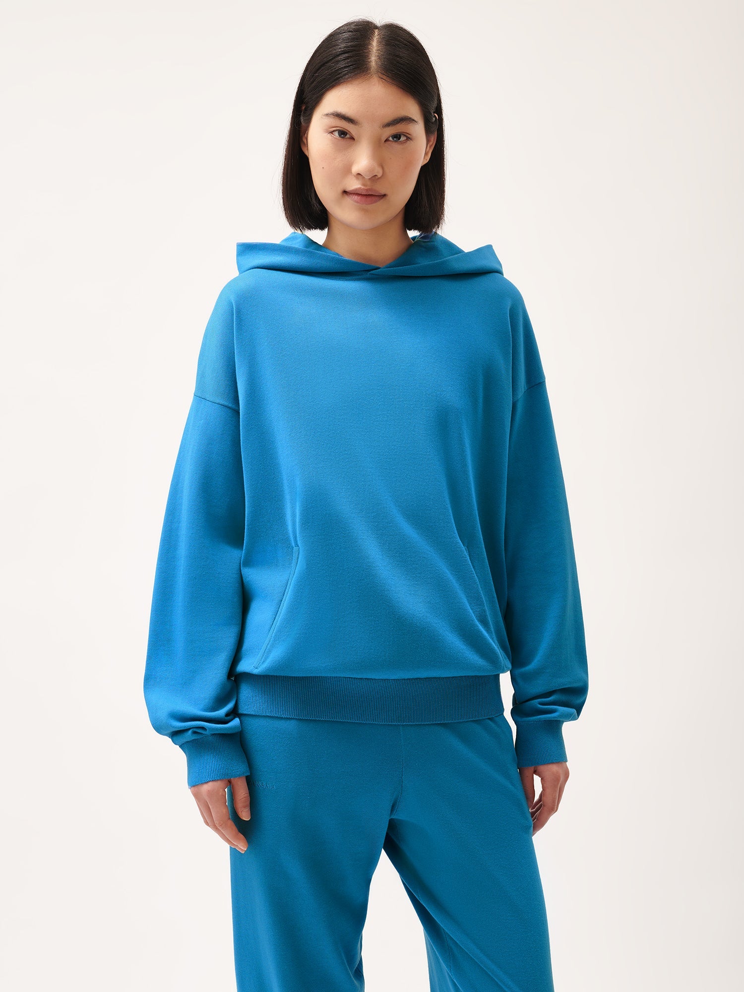 DNA_Knitted_Hoodie_Geyser_Blue_female-1