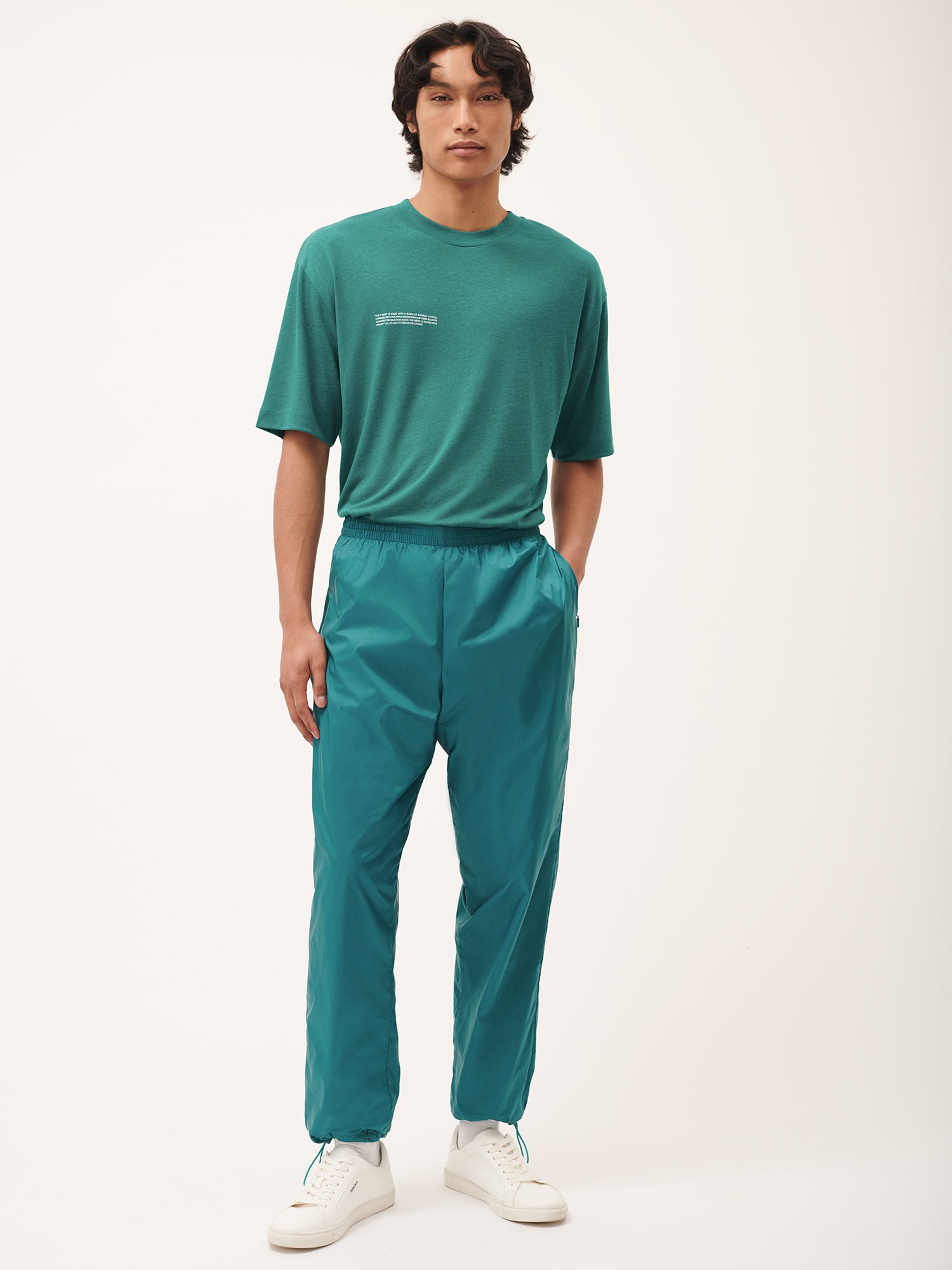 DNA_Recycled_Nylon_Track_Pants_Scarab_Teal_Male