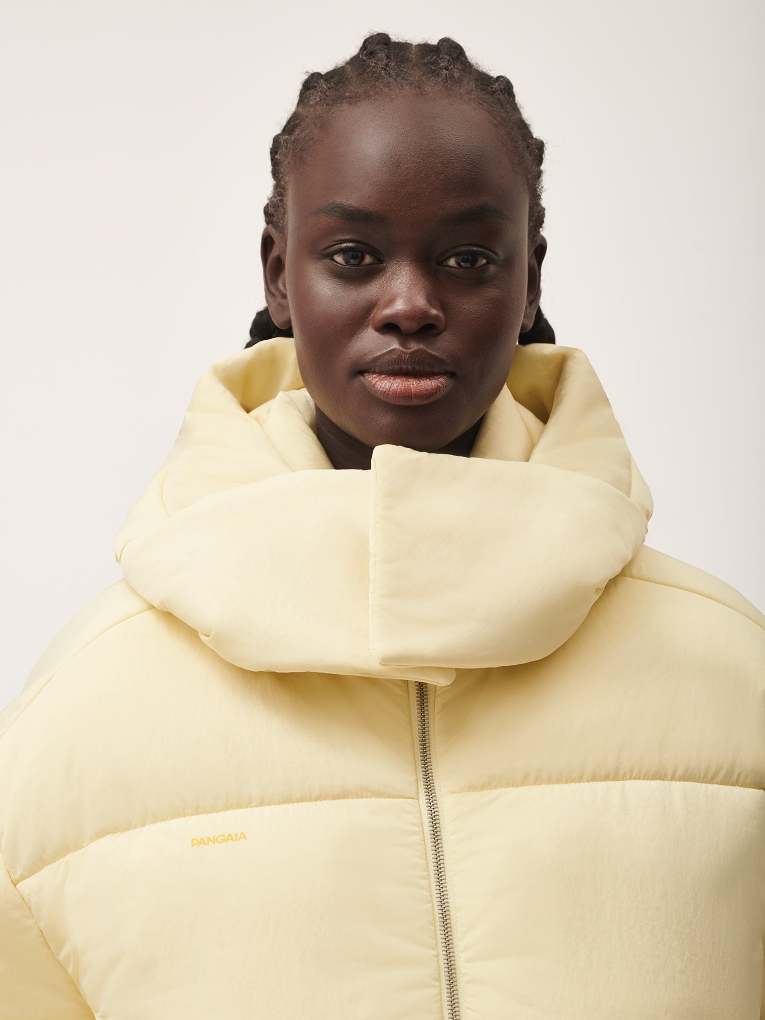 Womens_FLWRDWN_Recycled_Nylon_Cropped_Puffer_Rind_Yellow-female-3