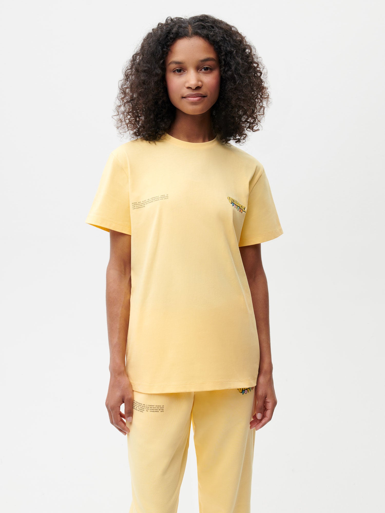 Pangaia-Roberto-Lugo-T-Shirt-Tyre-Planter-Graphic-Buttercup-Yellow-Female-1