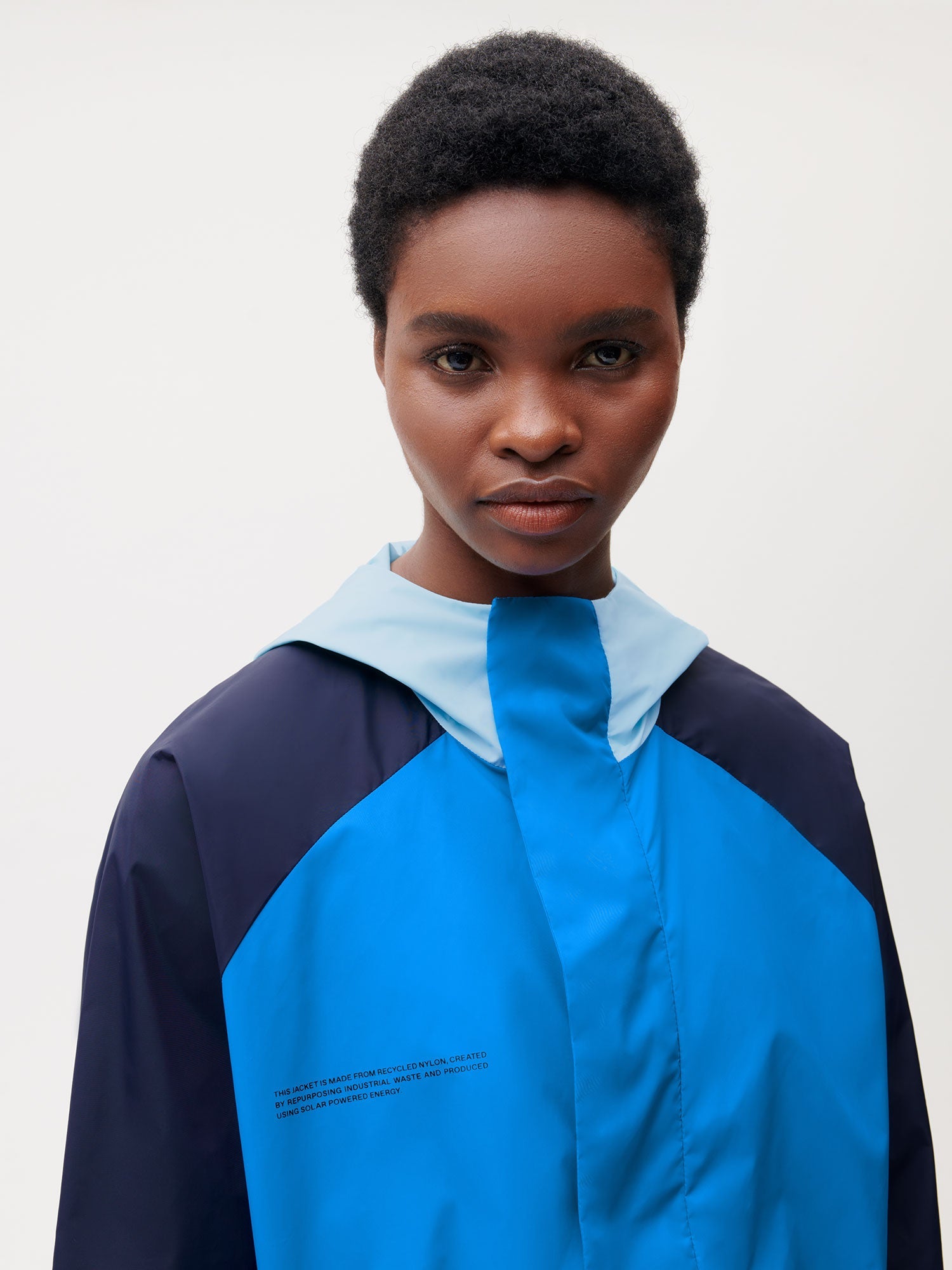 Recycled Nylon Color Block Jacket—cerulean blue female