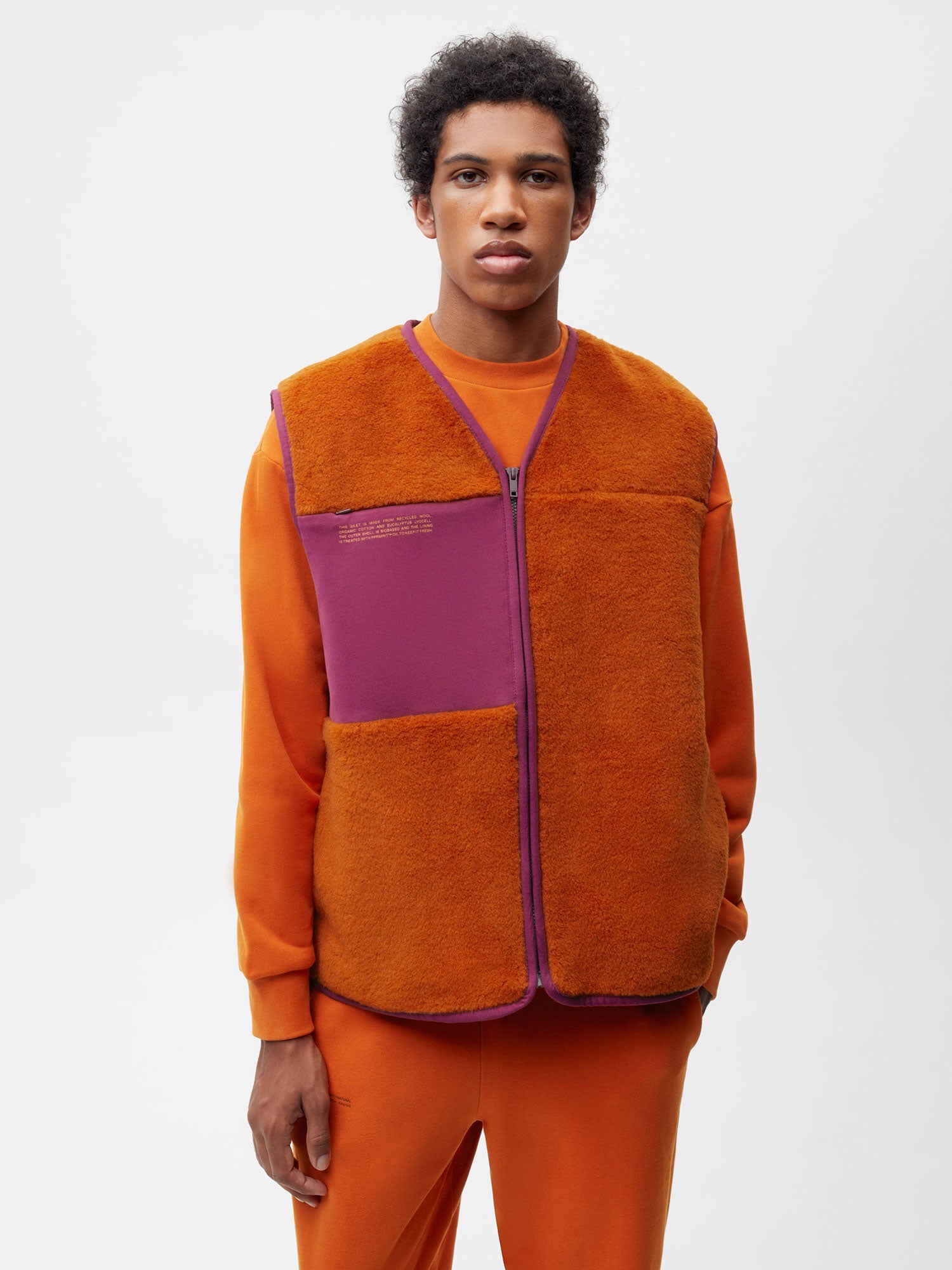 Recycled Wool Fleece Gilet—cinnamon orange male